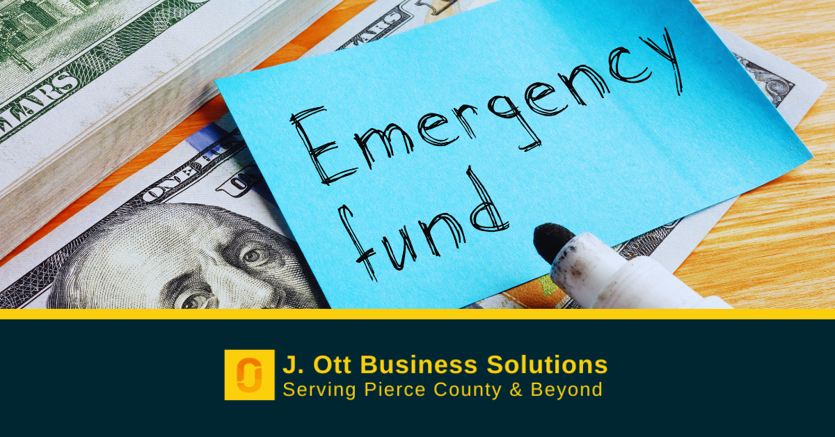 A post it note reads emergency fund on cash.